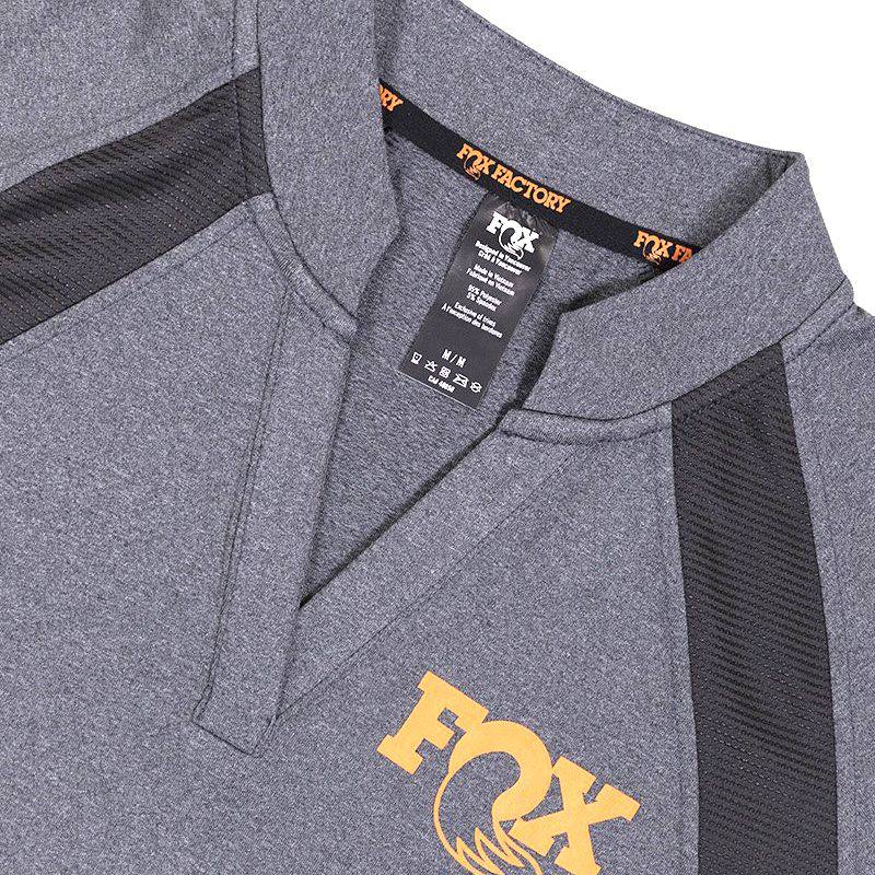 Fox women's moisture-wicking polo shirt with breathable performance jersey fabric, shown in a stylish fit.