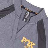 Fox women's moisture-wicking polo shirt with breathable performance jersey fabric, shown in a stylish fit.