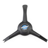 Park Tool EWS-1 electronic wire tool for Shimano Di2 and SRAM eTap battery installation, used in workshop settings.