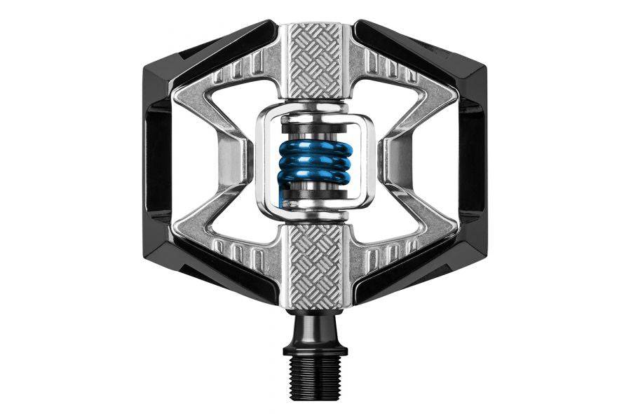 Crankbrothers Double Shot 2 hybrid MTB pedals in black and silver with adjustable cleats, suitable for mountain biking components.