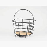 AtranVelo Epic Curve AVS bike basket with bamboo base, 24.5L capacity, mounted on a bicycle for carrying essentials.