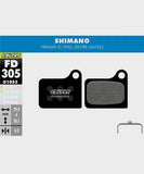 Galfer standard bike disc brake pads showing metal friction surfaces and mounting hardware for reliable, quiet braking performance.
