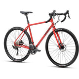 Genesis Croix De Fer 20 Alt Adventure Bike with Shimano GRX drivetrain and tubeless-ready wheels, shown with rugged frame and off-road tires.
