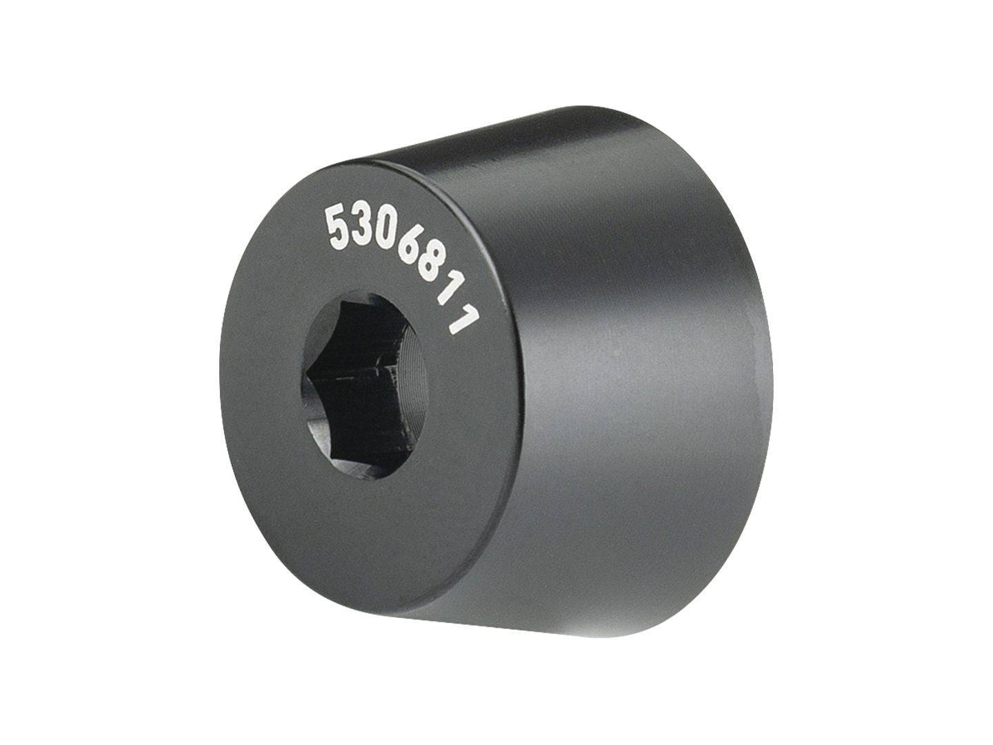 Black Trek 2024 Supercaliber main pivot collet wedge spacer, 12mm by 6mm, shown installed on mountain bike component.