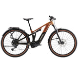 Trek Powerfly FS+ 4 EQ electric mountain bike with full suspension and 29-inch wheels, ready for rugged outdoor trails.