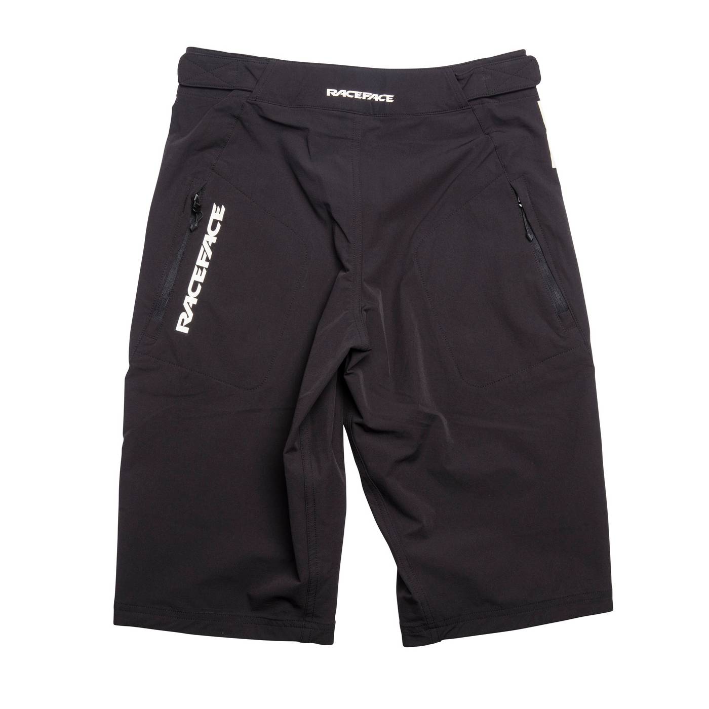 Race Face Sendy Youth Mountain Bike Shorts showing adjustable waist, zippered pockets, and durable fabric for kids' cycling gear.