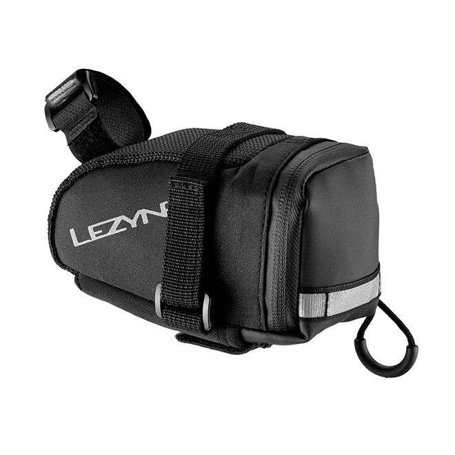 Lezyne M-Caddy medium saddle bag in black with water-resistant zipper and reflective logos on a bicycle seat.