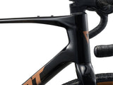 Giant Revolt Advanced 2 MY26 gravel bike with shock absorption and adjustable wheelbase, featuring a sleek frame and racing tires.