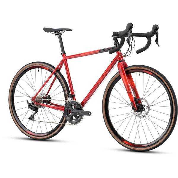 Genesis Equilibrium Disc Road Bike with Shimano 105 R7000 gears and rack mounts, ready for versatile cycling adventures.