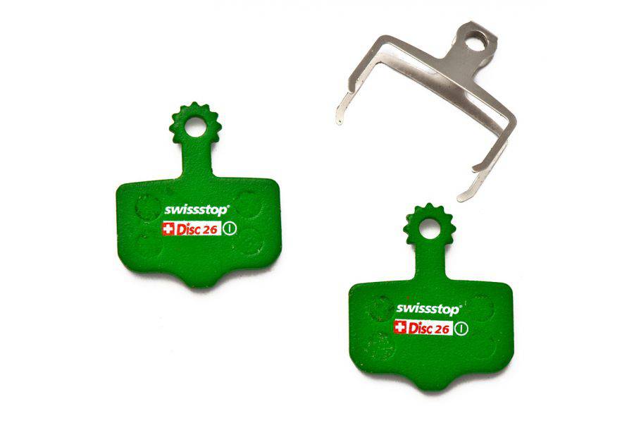 SwissStop Disc 26 brake pads for SRAM and Avid MTB Green disc brakes, shown with green brake pad material and metal backing plates.