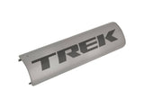 Trek 2022 District+ 9 RIB battery cover in metallic gunmetal black for e-bike components, showing a sleek, rounded design.