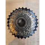 Shimano Tourney TY MF-TZ500 7-speed screw-on freewheel with 14-34T gear range for bike components, shown with sprockets and threading