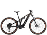 Trek Powerfly FS+ 4 full suspension e-mountain bike with Bosch Performance Line CX motor and 600Wh battery in outdoor trail setting