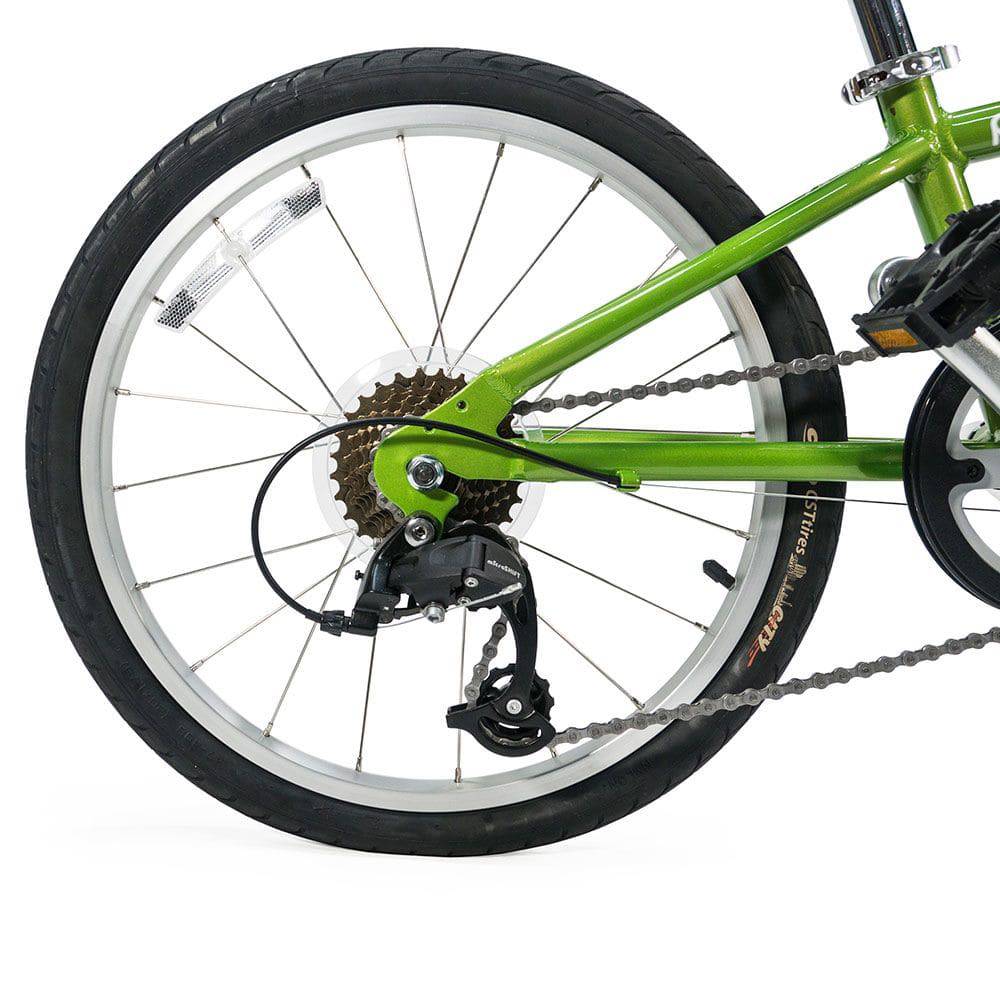 Burley Piccolo Kids Bike Trailer with adjustable seat and 7-speed gears, designed for children aged 4-10, attached to a bicycle.