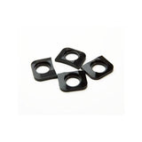Race Face chainring tab shims pack of 4, spare components for bike cranksets, shown in a close-up image.
