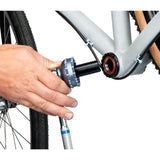 Park Tool GPS-24 guide pin for Shimano 24mm axle bottom bracket tools, shown in a workshop setting with the tool in focus.