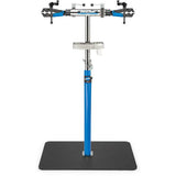 Park Tool RPP-1 repair stand post protector on 2-inch diameter workshop bike stand post, black rubber guard for PRS-2 and PRS-3.
