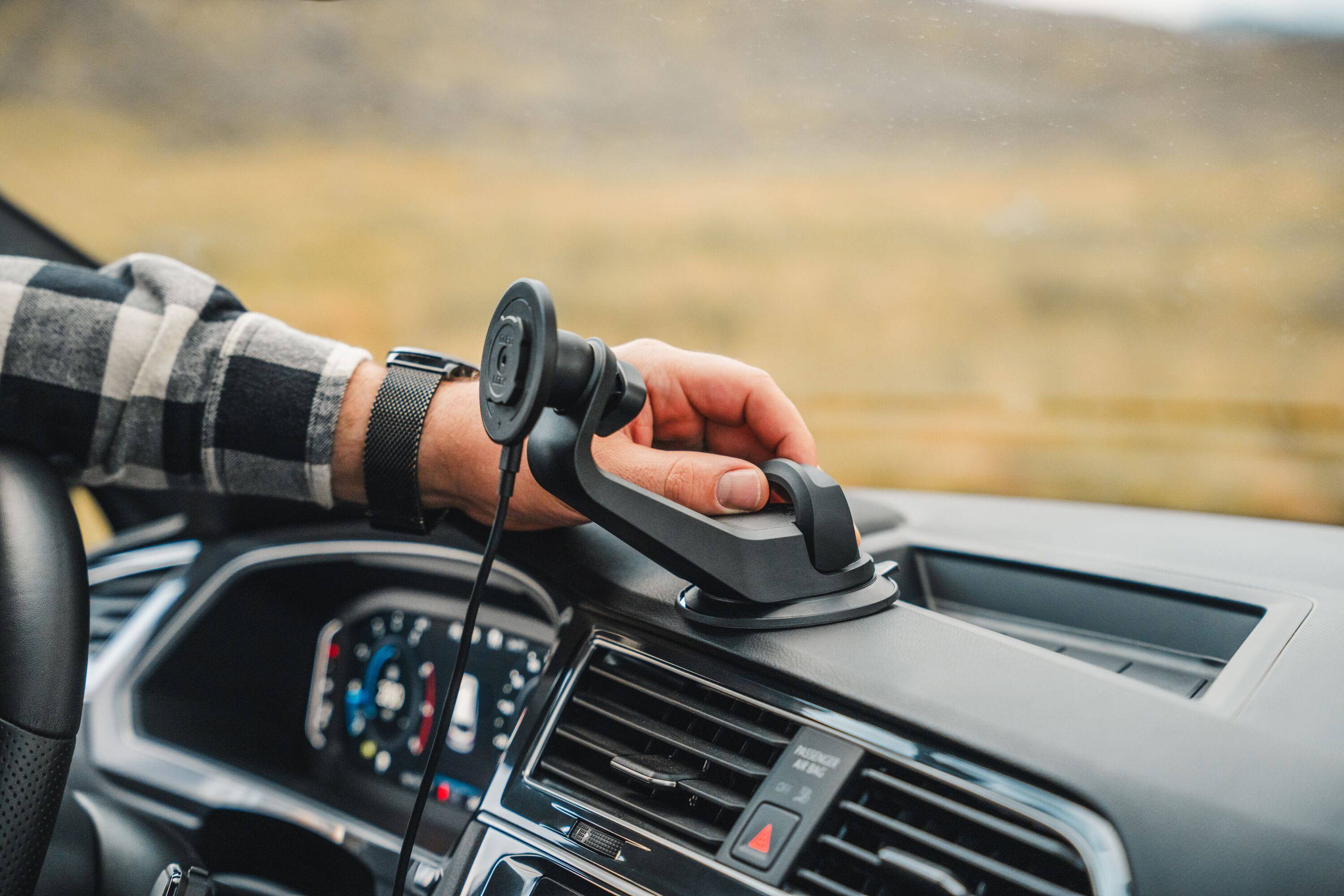 Quad Lock V6 Window and Dash Car Mount with adjustable 360° gimbal head, featuring secure attachment and versatile viewing angles.