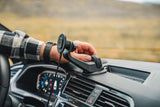 Quad Lock V6 Window and Dash Car Mount with adjustable 360° gimbal head, featuring secure attachment and versatile viewing angles.