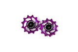 Pair of Hope 12-tooth jockey wheels for bike drivetrain, showing smooth, durable components designed for efficient cycling performance.