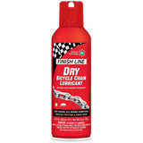 Finish Line Dry Chain Lube Ceramic Tech aerosol lubricant box of 6, workshop setting with bike components.