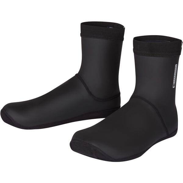 Madison Flux waterproof closed sole overshoes for cycling, showing black protective footwear with reflective details.