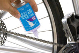 White Lightning Wet Ride synthetic chain lube in an 8oz bottle, designed for wet and muddy cycling conditions.