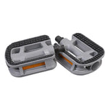 Passport Off Peak flat pedal with reflectors for urban commuting, designed for everyday shoes, durable bike component.