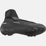 Shimano MW5 MTB cycling shoes with waterproof DryShield material, warm lining, and reflective details for outdoor riding.