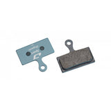 Jagwire Sport Organic disc brake pads for Shimano and RideRever Cargo-D, blue color, designed for bicycle brake components.