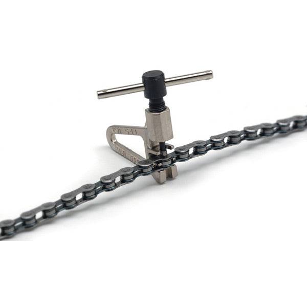 Park Tool CT-5 Mini Chain Brute bike chain tool for 5-12 speed bicycle chains, shown in workshop setting