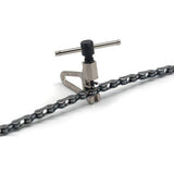 Park Tool CT-5 Mini Chain Brute bike chain tool for 5-12 speed bicycle chains, shown in workshop setting