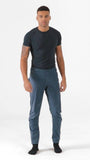 Rab Cinder Kinetic waterproof outdoor pants for men with an adjustable waistband, designed for durability and active outdoor wear.