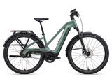 Giant Explore E+ 2 Stagger MY26 electric hybrid bike with SyncDrive Sport2 motor and advanced safety features, parked outdoors.