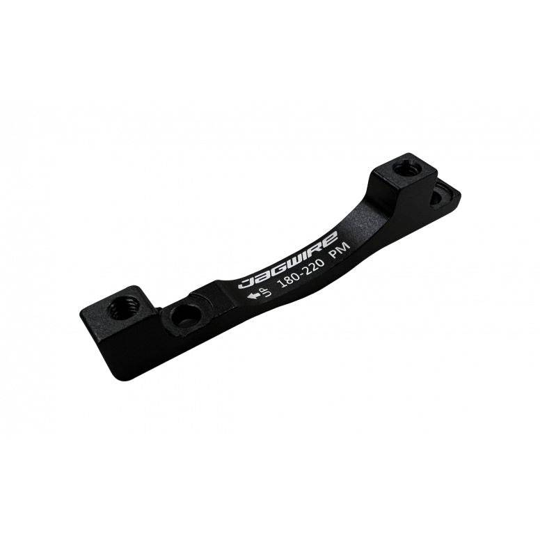 Jagwire post mount disc brake caliper adapter with hardware for rotor mounting, component for bike brake systems.