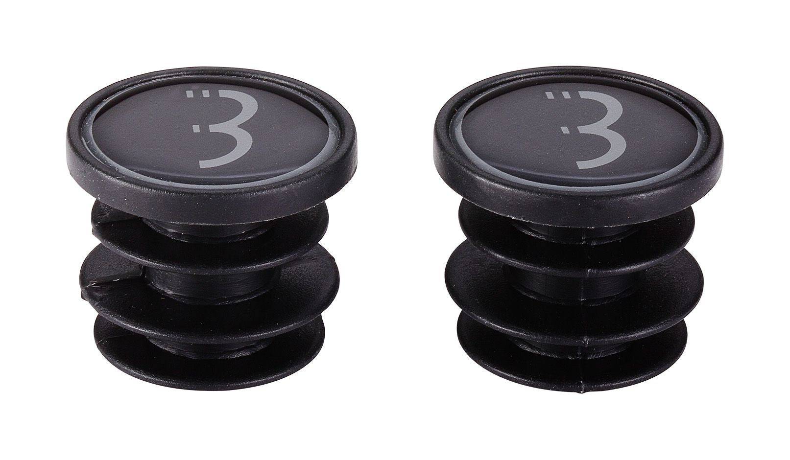 Pair of BBB BHT-92S black handlebar end caps with BBB logo, designed for bike bar tape security, shown on a bicycle handlebar.