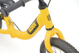 Yellow Ridgeback Scoot 2027 kids balance bike for toddlers age 2+ with a sleek frame and ergonomic design.