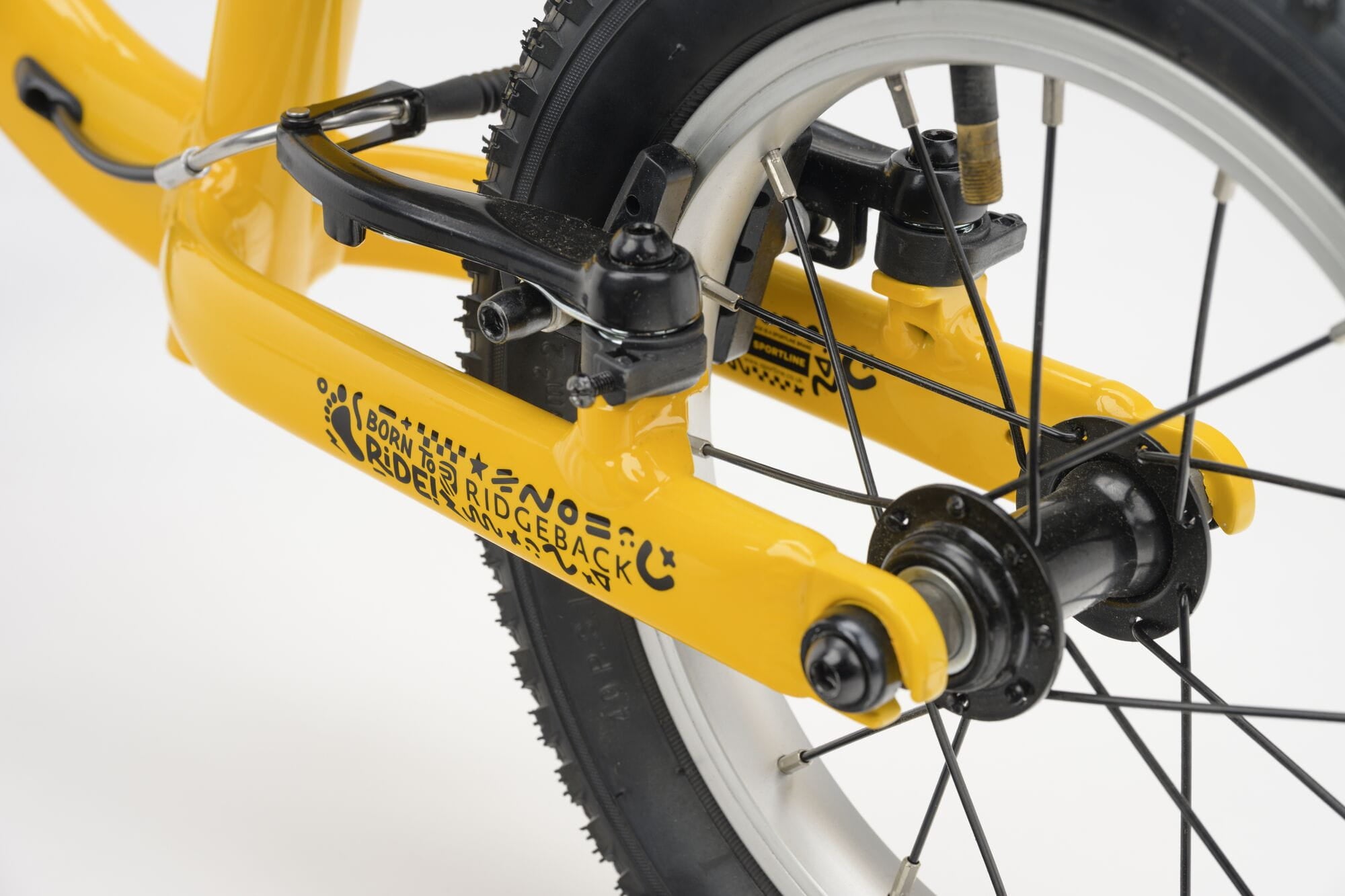 Yellow Ridgeback Scoot 2027 kids balance bike for toddlers age 2+ with a sleek frame and comfortable handlebars.