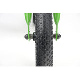 Green Ridgeback Scoot 2027 kids' balance bike for toddlers age 2+ with a sleek frame and comfortable handlebars.