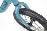Ridgeback Scoot 2027 kids' balance bike in teal for toddlers aged 2+, featuring a lightweight frame and ergonomic design.