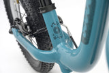 Ridgeback Scoot 2027 kids balance bike in teal, toddler-sized bike with sturdy frame and ergonomic handles for children age 2+.