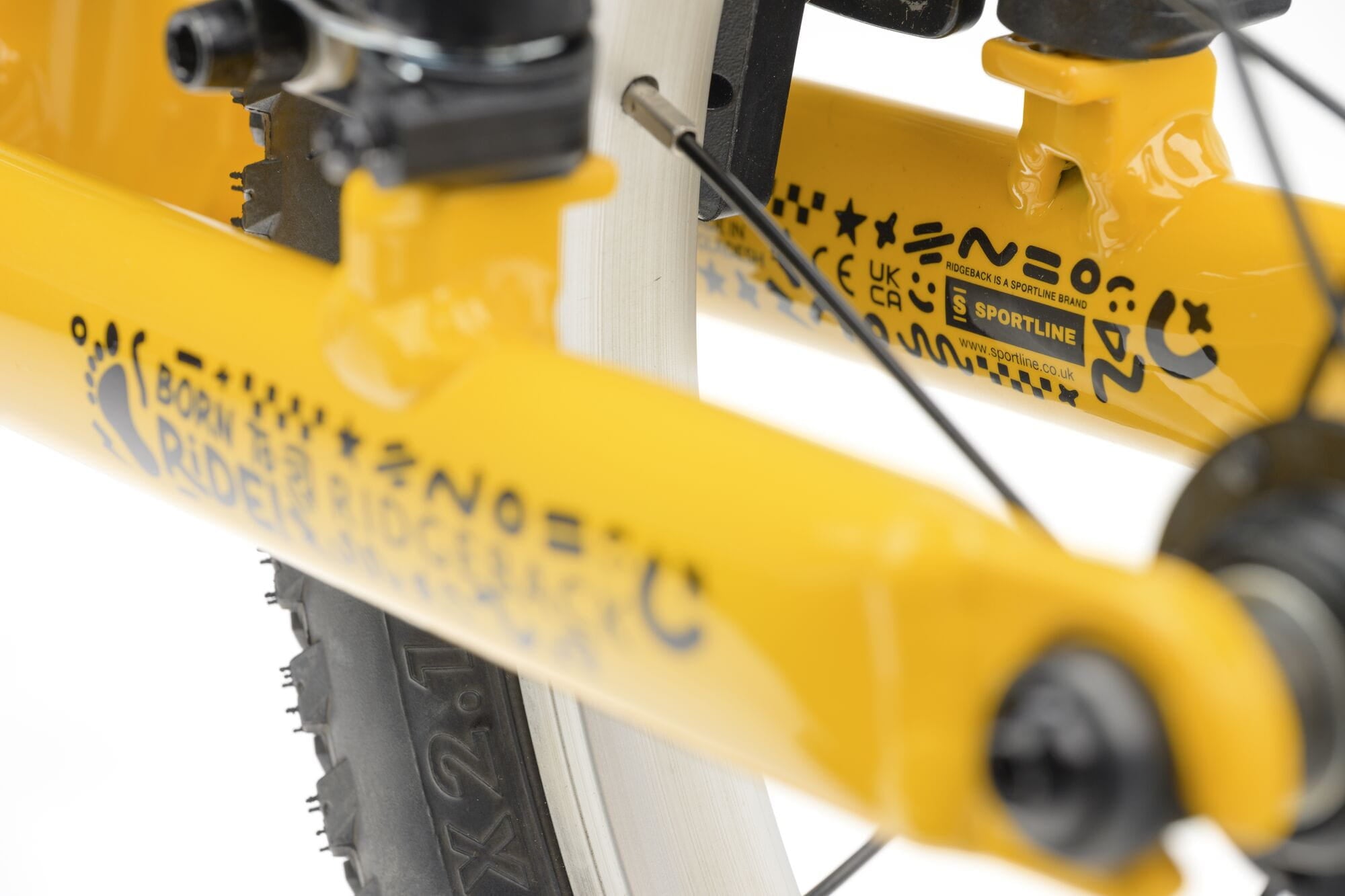 Yellow Ridgeback Scoot XL kids balance bike with 14-inch wheels, designed for beginner riders aged 3 and up.