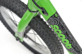 Green Ridgeback Scoot XL kids balance bike, 14-inch model for ages 3+, designed for beginner riders.