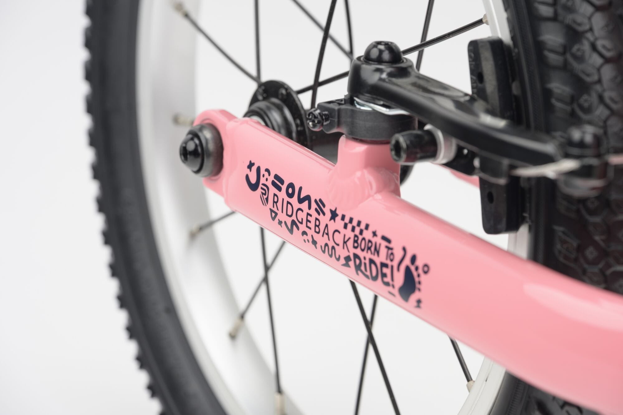 Pink Ridgeback Scoot XL 14-inch kids balance bike for ages 3+ with a lightweight frame and beginner-friendly design.