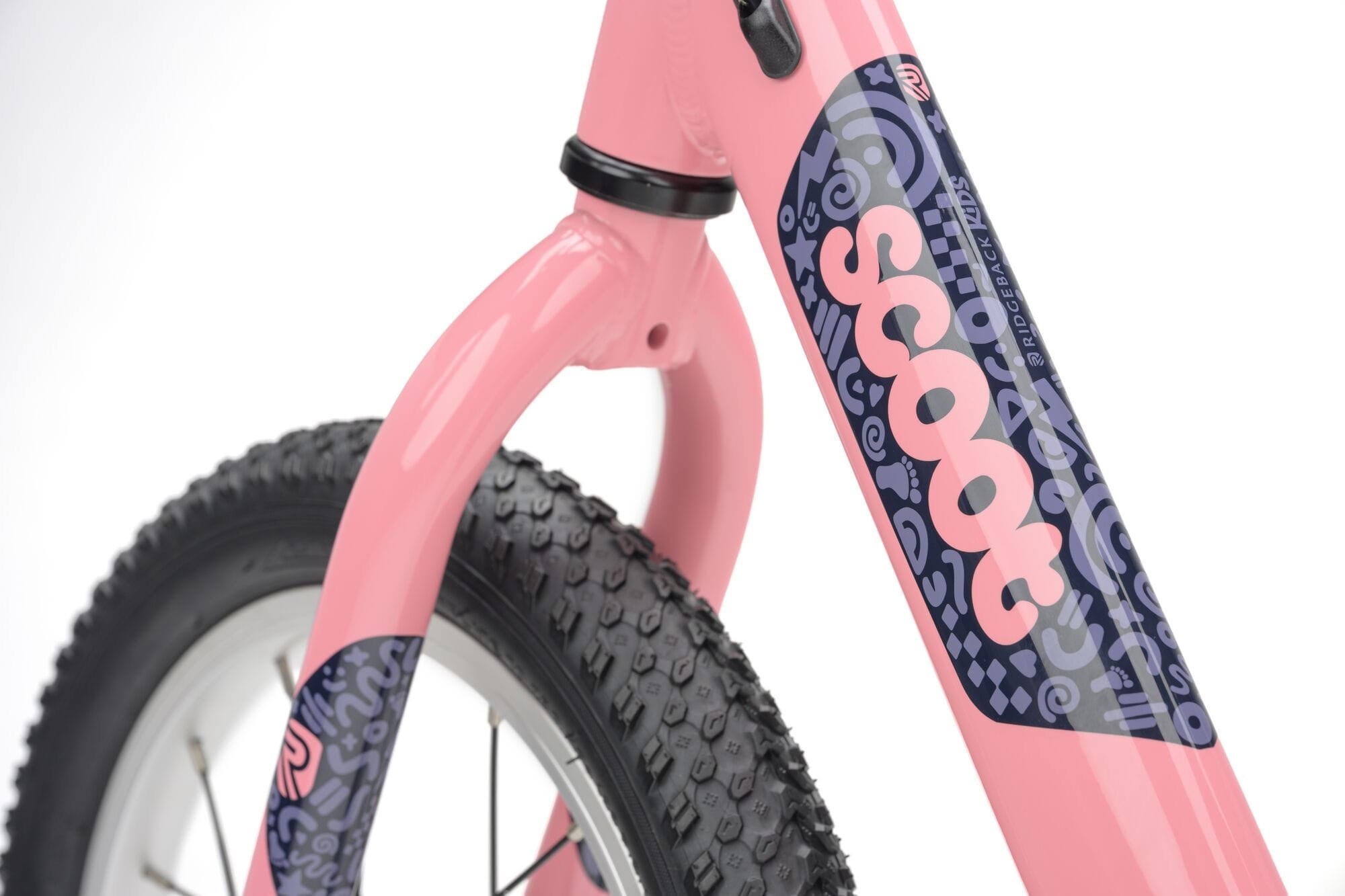 Pink Ridgeback Scoot XL kids balance bike with 14-inch wheels, designed for beginner riders aged 3 and up.
