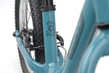 Ridgeback Scoot XL Kids Balance Bike in teal, 14-inch model for children ages 3 and up, featuring a lightweight frame and beginner-friendly design.