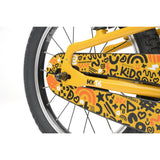 Yellow Ridgeback MX16 kids bike with 16-inch wheels, suitable for children ages 3.5 to 6, featuring adjustable seat and handlebars.