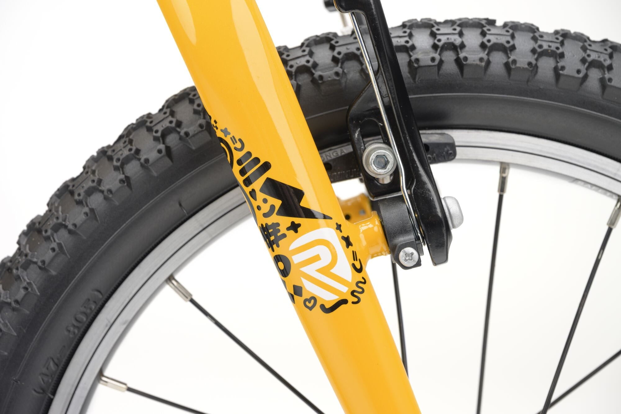 Yellow Ridgeback MX16 kids bike with 16-inch wheels, adjustable frame for children aged 3.5 to 6 years, detailed close-up.