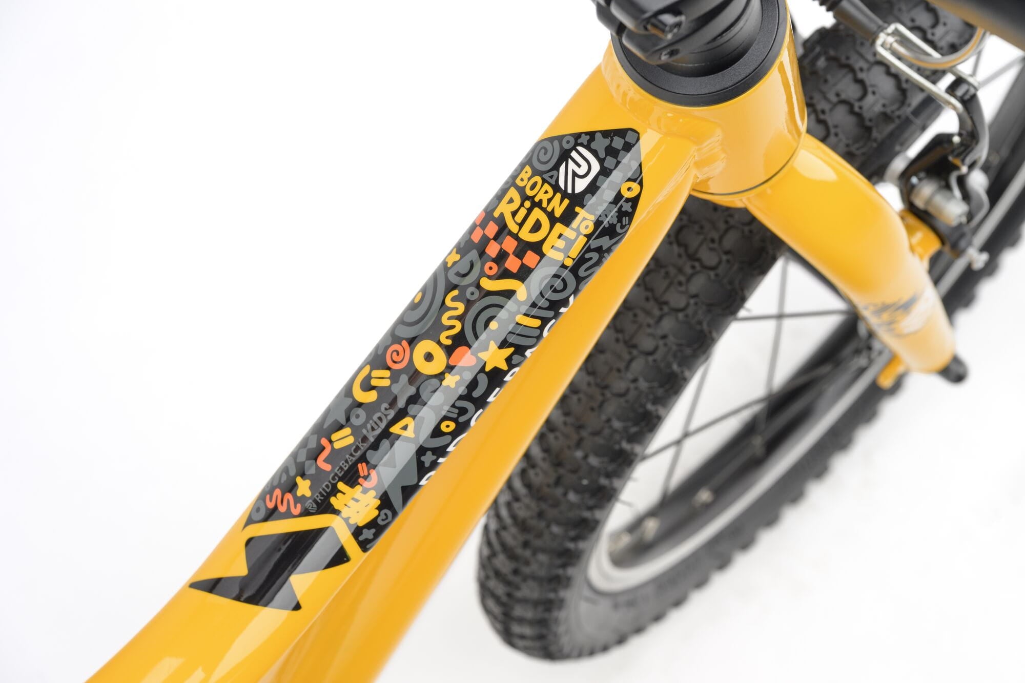 Yellow Ridgeback MX16 kids bike with 16-inch wheels, adjustable for ages 3½ to 6 years, featuring a sturdy frame and training wheels.