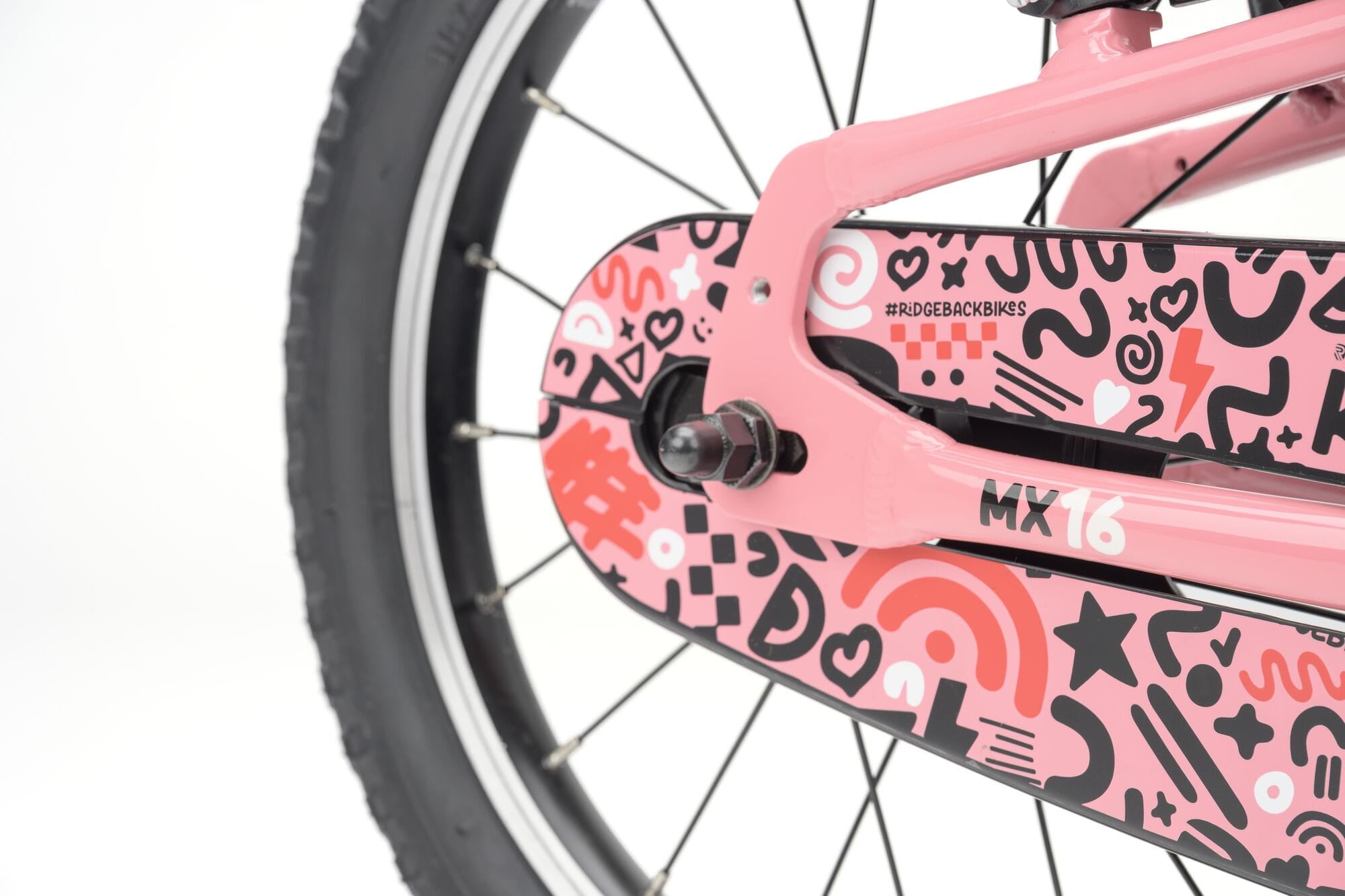 Pink Ridgeback MX16 kids bike with adjustable 16-inch wheels for children aged 3.5 to 6 years, featuring a sleek frame and training wheels.